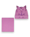 Zestaw czapka i komin dla dziewczynki PanPan 35 - bawełniany komplet z kokardą i rogiem jednorożca, w różowym kolorze, leży płasko na białym tle.